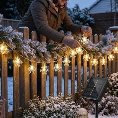 Guirlande lumineuse sur clôture basse