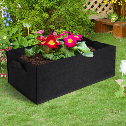 jardiniere moderne avec fleurs dehors